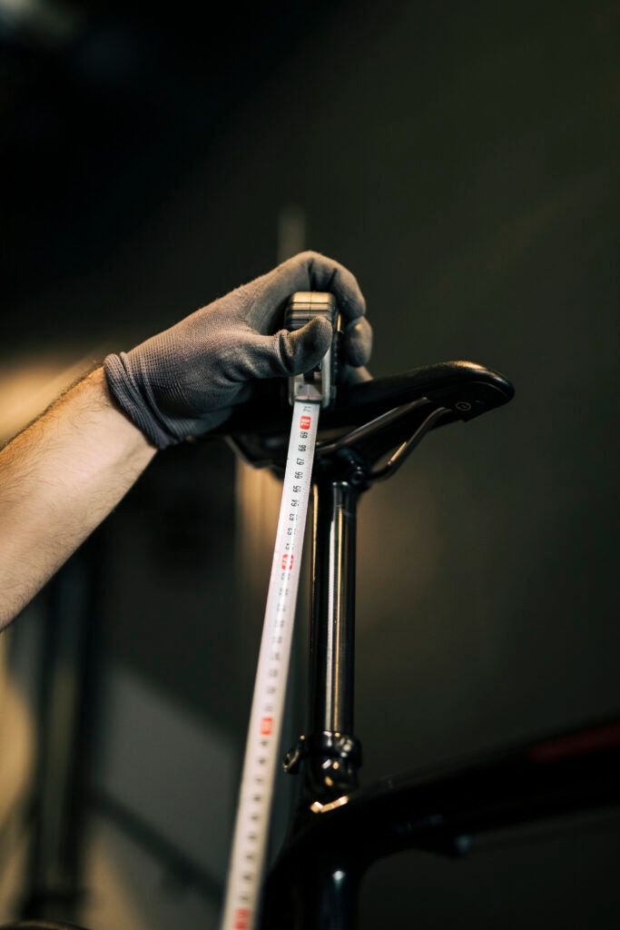 mechanic-repairing-bicycle-1-683x1024.jpg