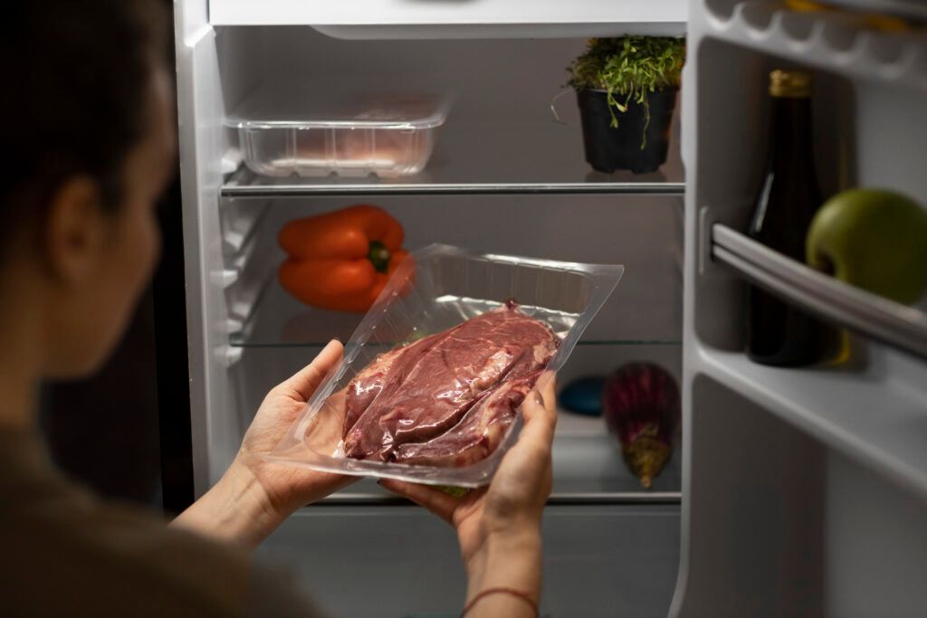 high-angle-woman-holding-meat-1024x683.jpg