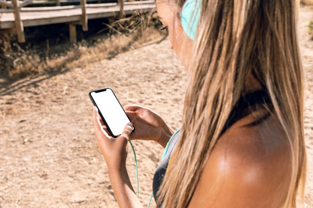 sporty-woman-looking-her-phone-mock-up-1024x683.jpg