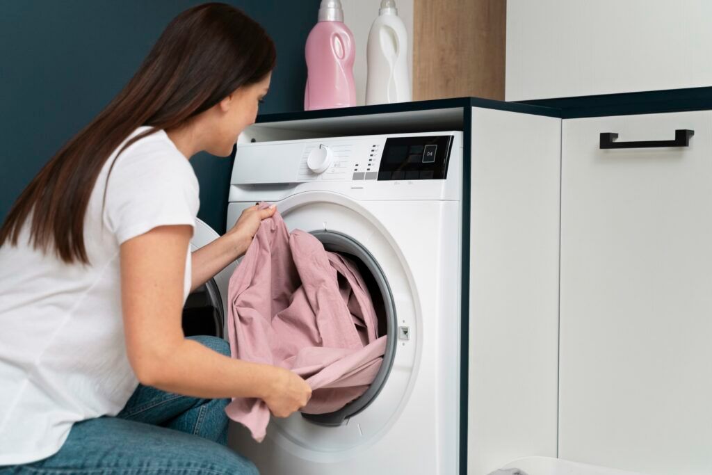 woman-taking-clothes-from-washing-machine-4-1024x683.jpg