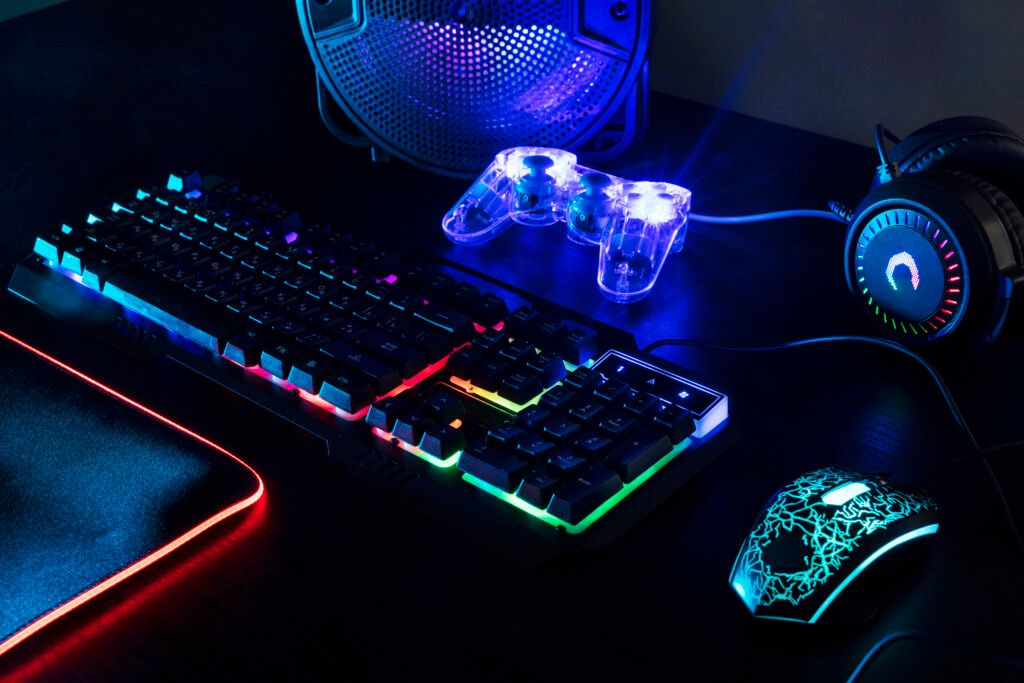 view-illuminated-neon-gaming-keyboard-setup-controller-1-1024x683.jpg