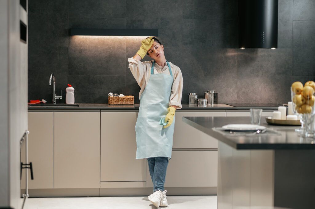kitchen-young-woman-apron-gloves-kitchen-1024x681.jpg