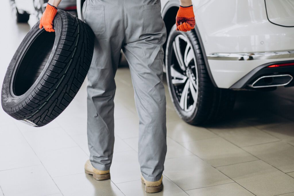 mechanic-changing-tires-car-service-1-1024x683.jpg