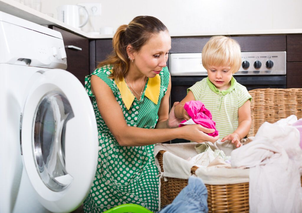woman-with-child-near-washing-machine-1024x724.jpg