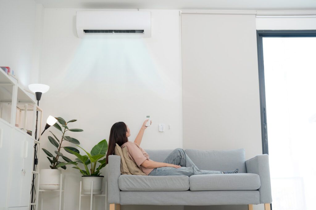 young-woman-enjoying-air-conditioning-home-1-1024x683.jpg